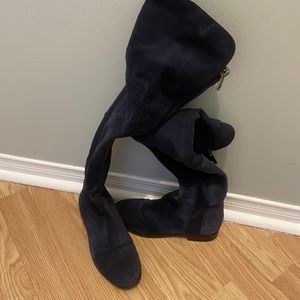 Over the knee, blue suede boots.